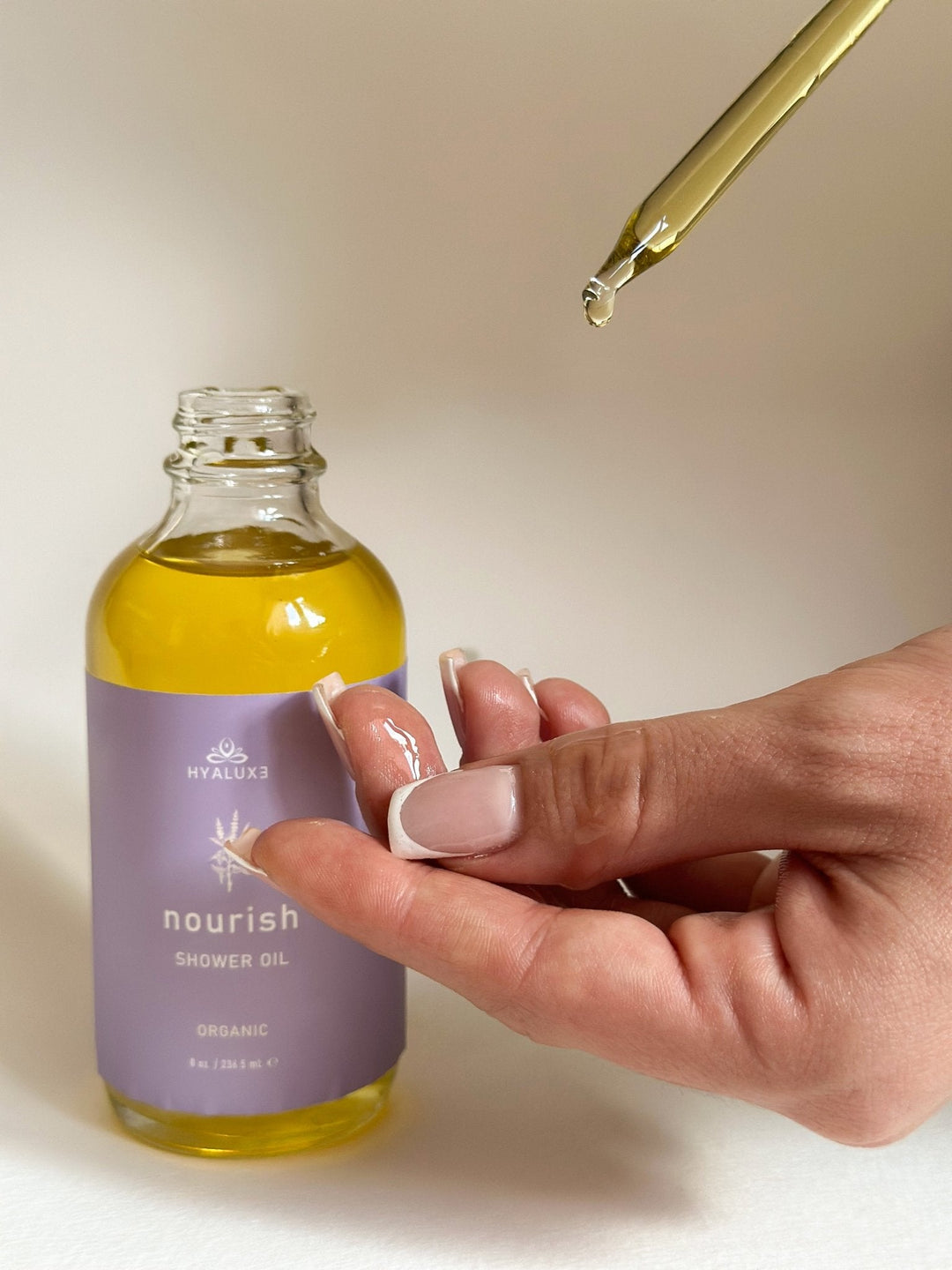 FREE NOURISH: Deep Restoration Shower Oil - Hyaluxe Body