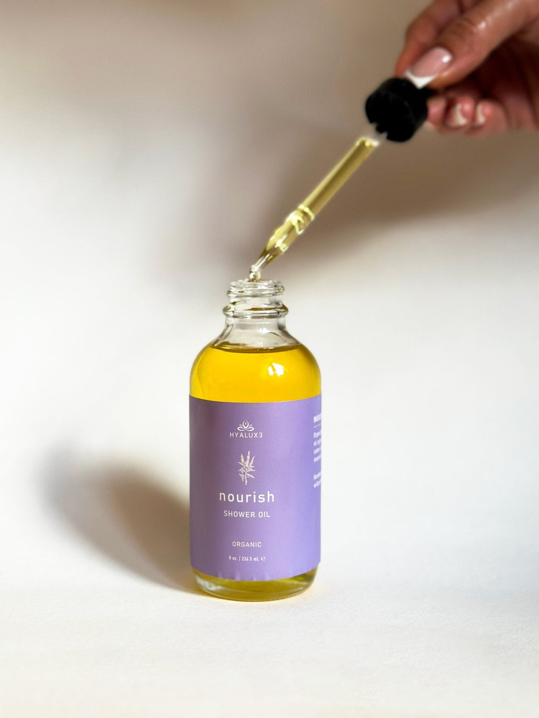 FREE NOURISH: Deep Restoration Shower Oil - Hyaluxe Body